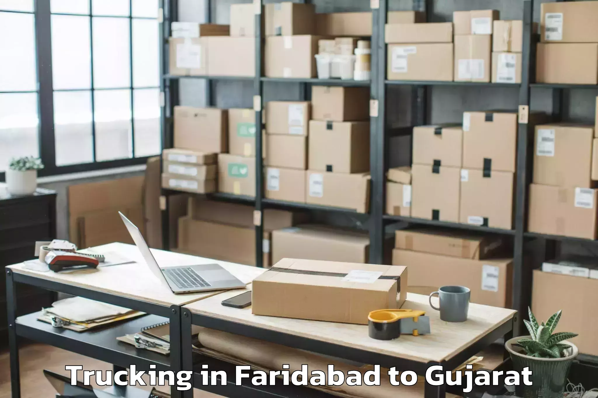 Easy Faridabad to Lavad Trucking Booking